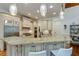 Gourmet kitchen with custom cabinets, granite countertops, and stainless steel appliances at 930 Shepards Ct, Roswell, GA 30075