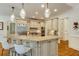 Beautiful kitchen with an oversized island, granite countertops, and custom cabinets at 930 Shepards Ct, Roswell, GA 30075