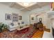 Inviting living room features coffered ceilings, a fireplace, and hardwood floors at 930 Shepards Ct, Roswell, GA 30075