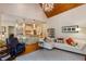 Open living area featuring a kitchen with granite countertops and a seating area with a decorative chandelier at 930 Shepards Ct, Roswell, GA 30075