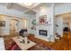 Spacious living room boasts a fireplace, hardwood floors and an open floor plan at 930 Shepards Ct, Roswell, GA 30075