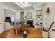 Bright office with built-in shelving, fireplace, and natural light, perfect for a home workspace at 930 Shepards Ct, Roswell, GA 30075