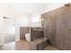 Bathroom with frameless glass shower and freestanding tub at 102 Red Oak Ln, Carrollton, GA 30116
