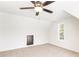 Well-lit bedroom with carpet and a modern ceiling fan at 102 Red Oak Ln, Carrollton, GA 30116