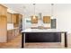 Bright open kitchen featuring a large kitchen island, stainless steel appliances, and a modern design at 102 Red Oak Ln, Carrollton, GA 30116