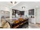 Renovated kitchen features an island with seating, modern appliances, and sleek countertops at 1767 Defoor Nw Ave # D, Atlanta, GA 30318
