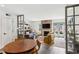 Inviting living room featuring a fireplace, modern decor, and an open layout to the kitchen at 1767 Defoor Nw Ave # D, Atlanta, GA 30318