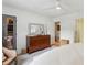 Bright main bedroom features a ceiling fan, walk-in closet, and en suite bathroom at 1767 Defoor Nw Ave # D, Atlanta, GA 30318
