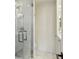 Glass shower featuring a rainfall shower head, and marble tile at 1767 Defoor Nw Ave # D, Atlanta, GA 30318
