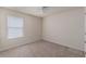 A secondary bedroom features fresh paint, new carpet, ample space and natural light at 27 Autumn Canyon Se Path, Cartersville, GA 30121