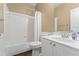 Bathroom features a tub-shower combo, single sink, and classic white fixtures at 550 Vinings Springs Se Dr, Smyrna, GA 30126