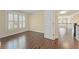 Bright bedroom features hardwood floors, natural light and neutral paint at 550 Vinings Springs Se Dr, Smyrna, GA 30126
