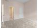 Bedroom with attached bathroom, large closets, and carpeted floor at 550 Vinings Springs Se Dr, Smyrna, GA 30126
