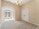 Bedroom with carpeting, a window for natural light, and a double closet at 550 Vinings Springs Se Dr, Smyrna, GA 30126