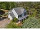 Charming two-story home with a covered front porch and mature landscaping at 550 Vinings Springs Se Dr, Smyrna, GA 30126