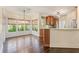Spacious kitchen open to the breakfast nook with wooden cabinets and stainless steel appliances at 550 Vinings Springs Se Dr, Smyrna, GA 30126