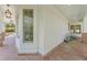 Charming porch features brick flooring, white siding and trim and stylish lighting at 550 Vinings Springs Se Dr, Smyrna, GA 30126