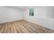 Finished basement offers a large window providing natural light and durable flooring at 87 Fair Havens Dr, Hiram, GA 30141