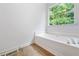 Bright bathroom featuring a soaking tub at 87 Fair Havens Dr, Hiram, GA 30141