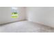 Bedroom with bright window and neutral carpet. Ready to be styled as your own at 87 Fair Havens Dr, Hiram, GA 30141