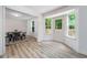 Bright dining area features a table with chairs and a view of the outdoor deck at 87 Fair Havens Dr, Hiram, GA 30141