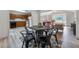 Open living space showcasing a combined dining and living area, with hardwood floors and neutral tones throughout at 87 Fair Havens Dr, Hiram, GA 30141