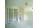 A freshly painted bedroom featuring a closet with modern door and neutral color at 2524 Glenrock Dr, Decatur, GA 30032