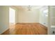 Bright dining area featuring hardwood floors, a modern chandelier, and ample space for entertaining guests at 2524 Glenrock Dr, Decatur, GA 30032