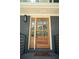 Stylish wooden front door with glass panes and modern hardware at 2524 Glenrock Dr, Decatur, GA 30032