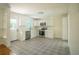Bright kitchen with white cabinets, stainless steel appliances, and patterned tile floors, perfect for cooking and entertaining at 2524 Glenrock Dr, Decatur, GA 30032