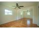Open concept living area with hardwood floors, neutral paint, and lots of natural light at 2524 Glenrock Dr, Decatur, GA 30032