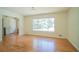 Bright and spacious living room with hardwood floors and a large window at 2524 Glenrock Dr, Decatur, GA 30032