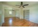 Open concept living area with hardwood floors, neutral paint, and lots of natural light at 2524 Glenrock Dr, Decatur, GA 30032