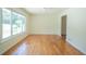 Bright and spacious living room with hardwood floors and a large window at 2524 Glenrock Dr, Decatur, GA 30032