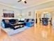Inviting living room with hardwood floors and an open floor plan that leads to the dining area at 4638 Villa Chase Ne Dr, Marietta, GA 30068