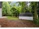 Large backyard with a shed at 5414 Iris Sw Dr, Mableton, GA 30126
