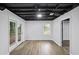 Finished basement area with sliding glass doors to the exterior and a view of the back yard at 5414 Iris Sw Dr, Mableton, GA 30126