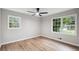 Bedroom features new floors, ceiling fan and lots of natural light at 5414 Iris Sw Dr, Mableton, GA 30126