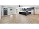 Open-concept with a large island and modern navy blue cabinets at 5414 Iris Sw Dr, Mableton, GA 30126