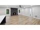 Spacious living room featuring a dark brick fireplace and lots of natural light at 5414 Iris Sw Dr, Mableton, GA 30126