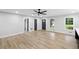 Bright, open-concept living area with hardwood floors and neutral walls at 5414 Iris Sw Dr, Mableton, GA 30126