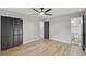 Main bedroom includes closet, new floors, ceiling fan and attached bath at 5414 Iris Sw Dr, Mableton, GA 30126