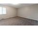Comfortable bedroom featuring neutral walls and new carpet at 5618 Stonington Trace Pkwy, Stone Mountain, GA 30087