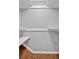 Bright and clean closet features built in shelving and a clothing rod at 1261 Lavista Ne Rd # E-8, Atlanta, GA 30324