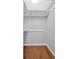Bright and clean closet features built in shelving and a clothing rod at 1261 Lavista Ne Rd # E-8, Atlanta, GA 30324