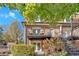 Charming exterior of a multi-story brick home with wrought iron balconies and landscaped surroundings at 1261 Lavista Ne Rd # E-8, Atlanta, GA 30324