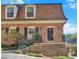 Charming home features a classic brick exterior, well-maintained landscaping, and inviting front entry at 1261 Lavista Ne Rd # E-8, Atlanta, GA 30324