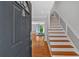 Inviting home entryway features gleaming hardwood floors and a staircase leading to the upper level at 1261 Lavista Ne Rd # E-8, Atlanta, GA 30324