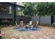 Outdoor seating area featuring a brick patio and well-maintained landscaping at 1860 Anjaco Nw Rd, Atlanta, GA 30309