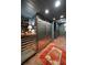 Basement with wine storage, stainless refrigerator, and laundry area at 1860 Anjaco Nw Rd, Atlanta, GA 30309